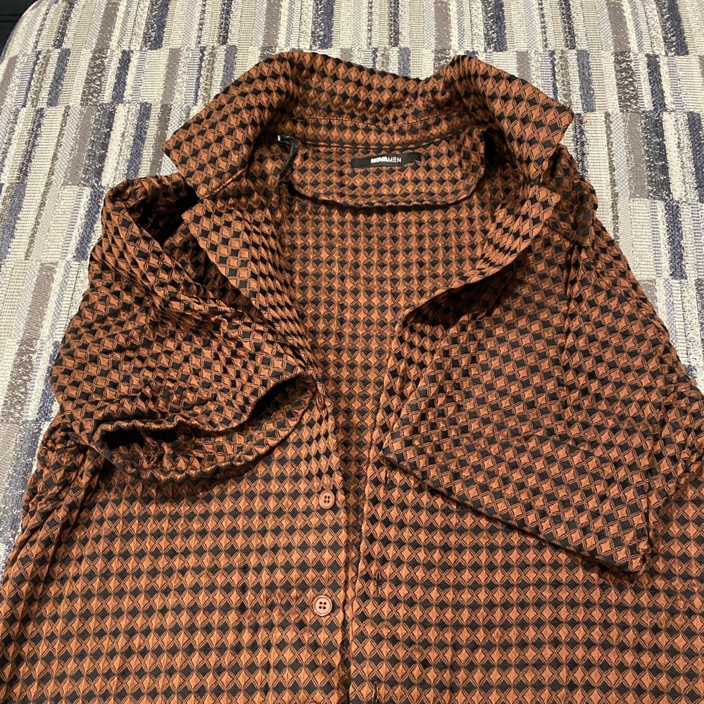 Gently worn. Original tags.